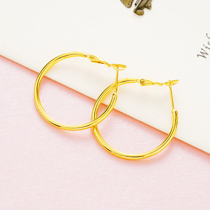Wholesale Fashionable and minimalist circle earrings with gold-plated ear loops and accessories