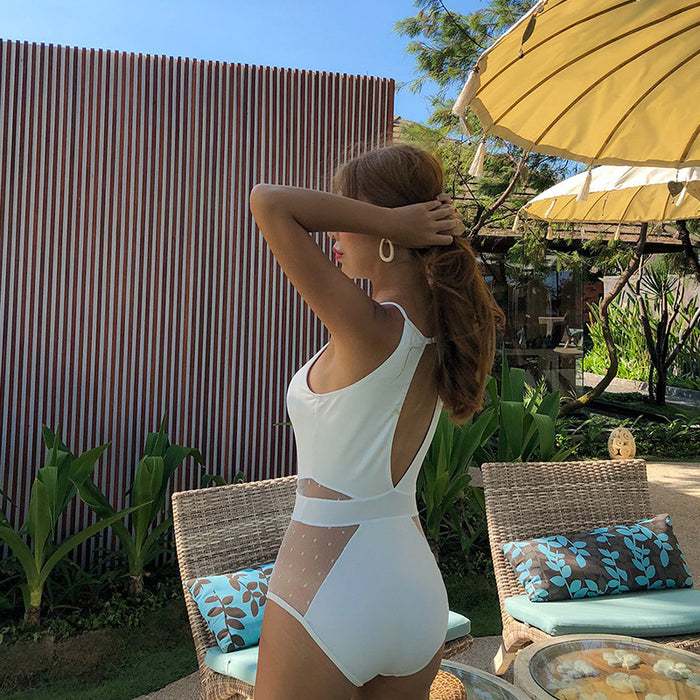 Wholesale Sexy and fashionable backless semi transparent triangle one-piece swimsuit, hot spring swimsuit, bikini
