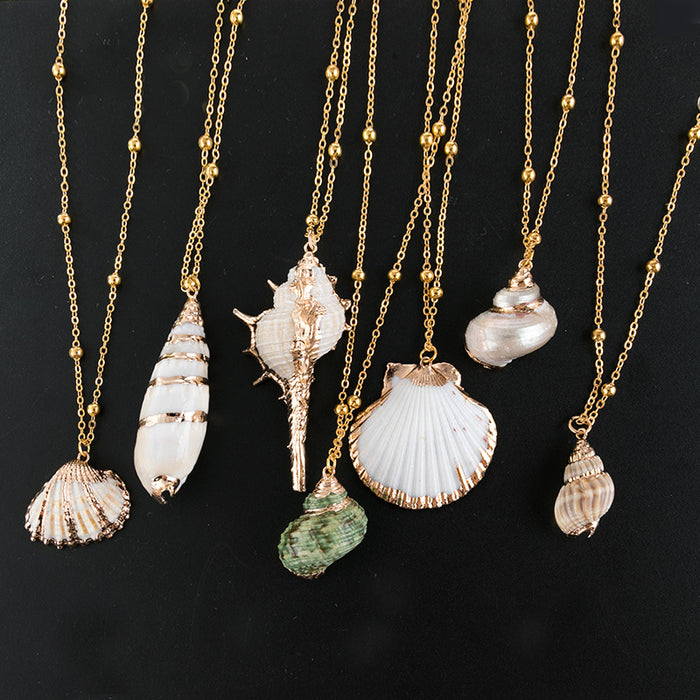 Wholesale Gold edged conch and seashell necklace