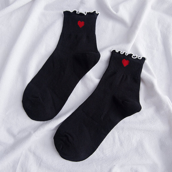 Wholesale Embroidered heart-shaped middle tube socks made of cotton and college style cotton socks