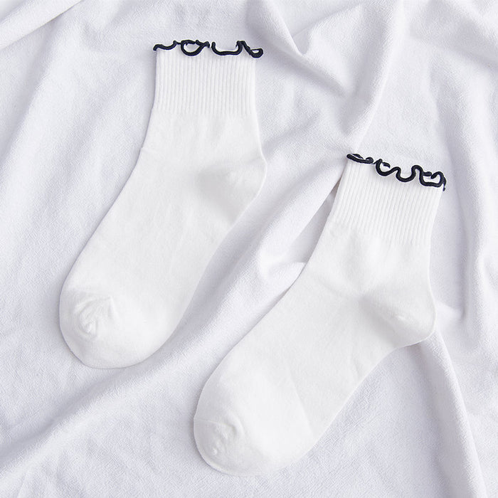 Wholesale Embroidered heart-shaped middle tube socks made of cotton and college style cotton socks