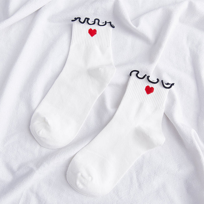 Wholesale Embroidered heart-shaped middle tube socks made of cotton and college style cotton socks