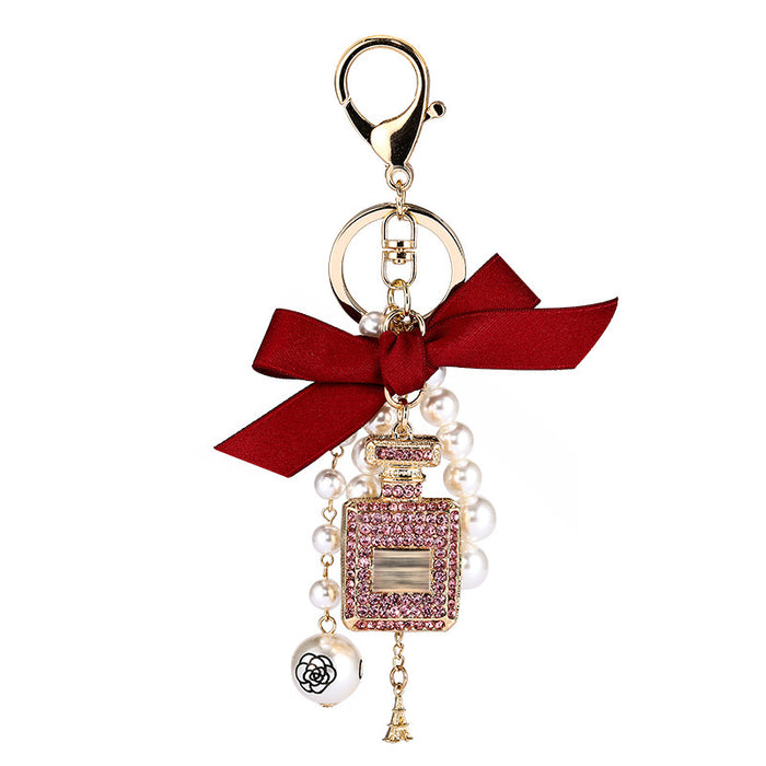 Wholesale Diamond Perfume Bottle Bow Pearl Alloy Keychain JDC-KC-CH120