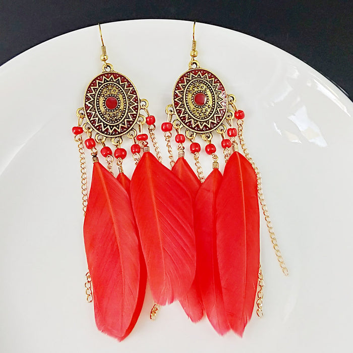 Wholesale Vintage earrings, fashionable feather chain tassel earrings, long style