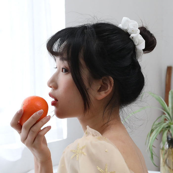 Wholesale Hairbands and headpieces with simple star shaped headbands, tied with hair tie fabric and floral headbands