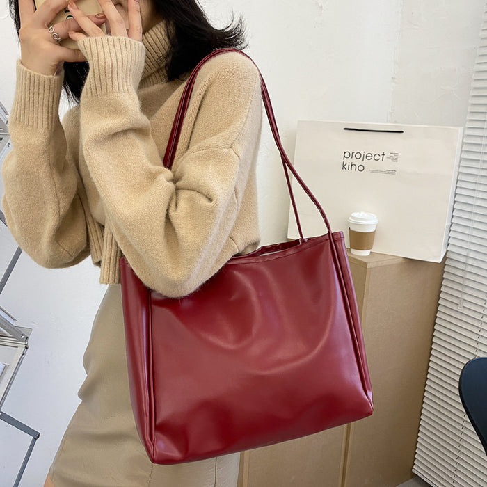 Wholesale Tote bag with simple temperament, large capacity shoulder bag, casual crossbody bag