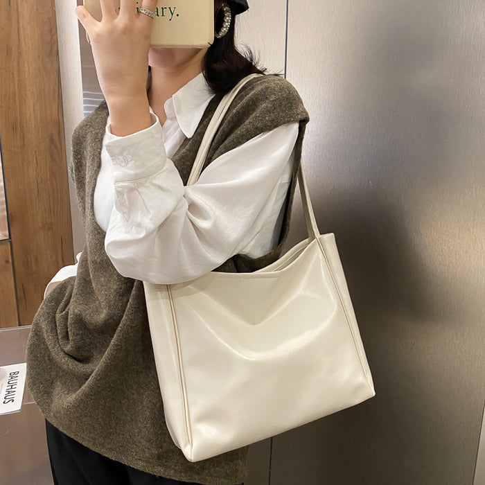Wholesale Tote bag with simple temperament, large capacity shoulder bag, casual crossbody bag