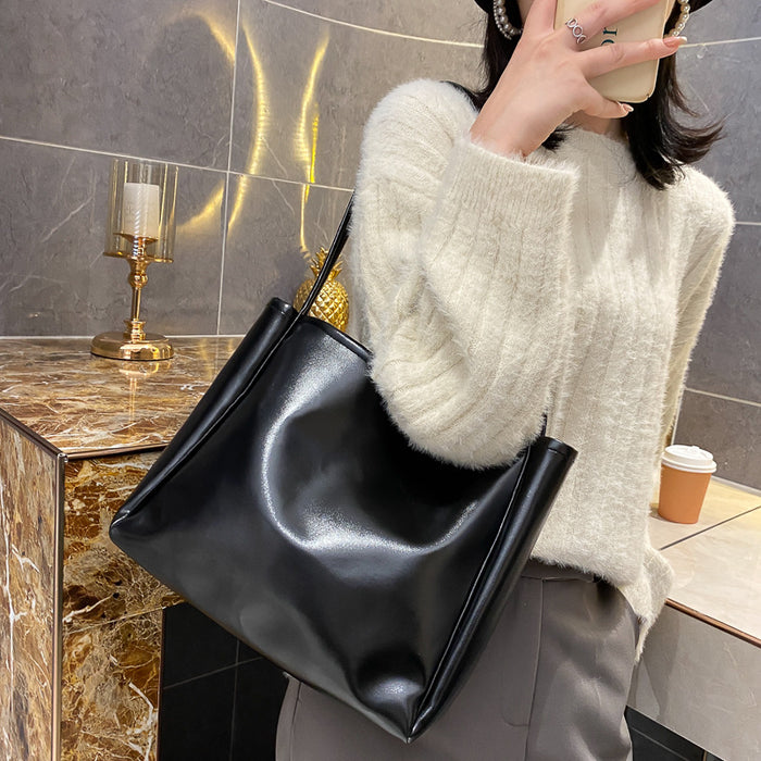 Wholesale Tote bag with simple temperament, large capacity shoulder bag, casual crossbody bag