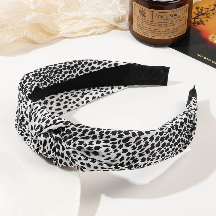 Wholesale Wide Edge Simple Fabric Leopard Knotted Headband JDC-HD-Yiyue001