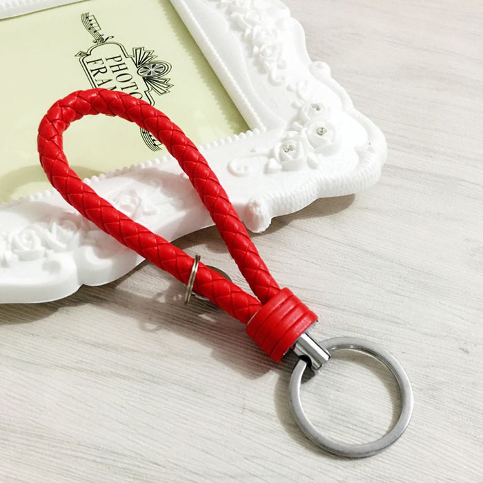 Wholesale Creative leather woven leather rope keychain, car keychain, gift