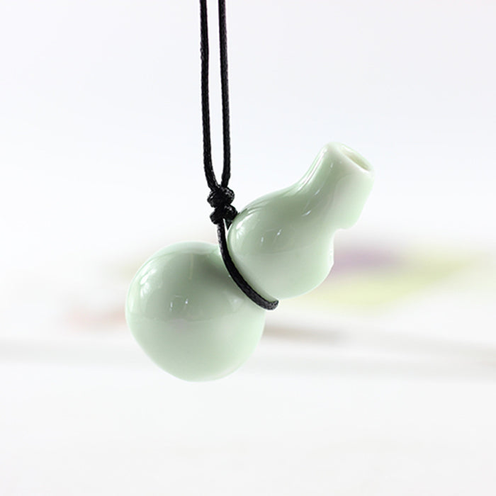 Wholesale Hulu whistle three-dimensional small whistle necklace small pendant ceramic whistle sweater chain necklace pendant