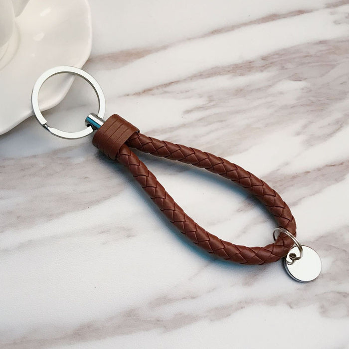 Wholesale Creative leather woven leather rope keychain, car keychain, gift