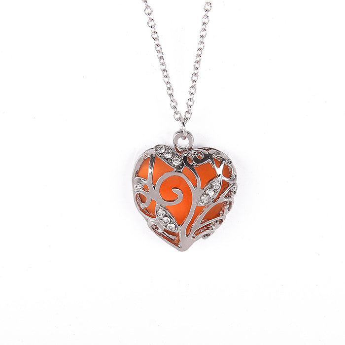 Wholesale Fashionable hollowed out luminous heart-shaped necklace, popular luminous pendant, collarbone chain accessory