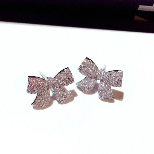Wholesale Silver needle earrings, fashionable and exquisite, super sparkling zircon temperament, bow earrings, earrings, earrings, pendants