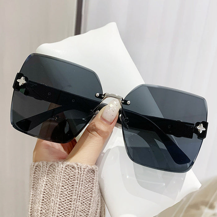 Wholesale Frameless Cut Edge PC Sunglasses JDC-SG-Chengy005