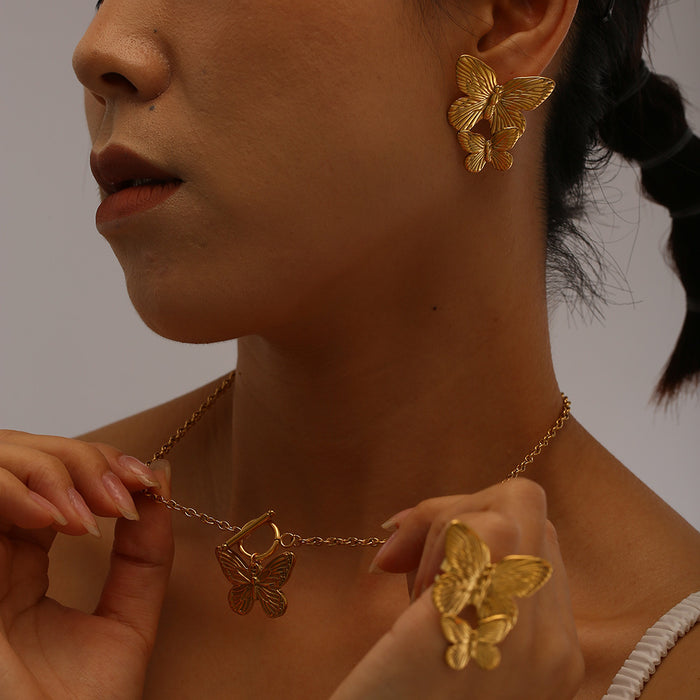 Wholesale Exaggerated personality stainless steel butterfly necklace ring earring set