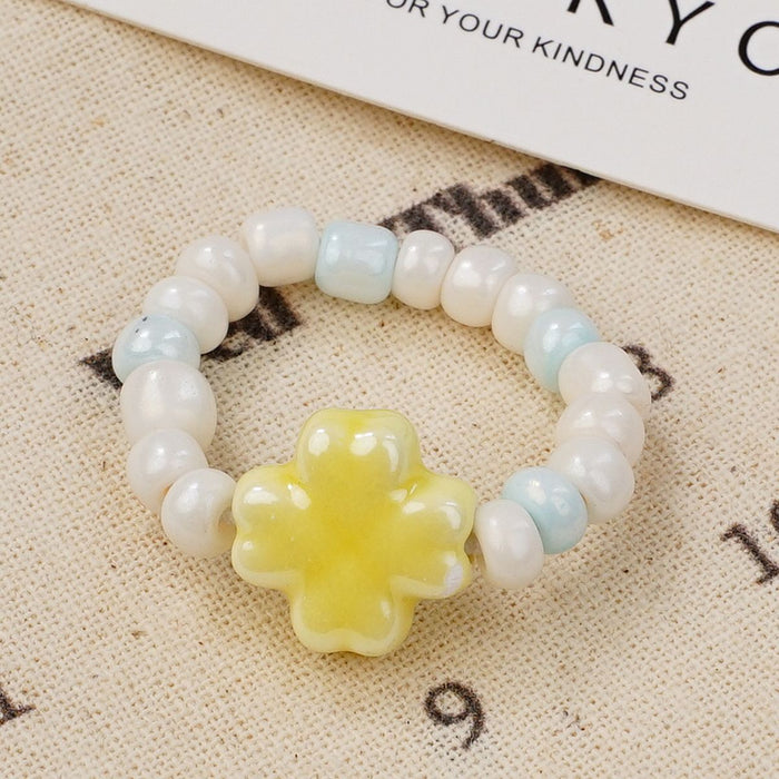 Wholesale New Ceramic Flower Ring Wholesale Student Versatile Handpiece