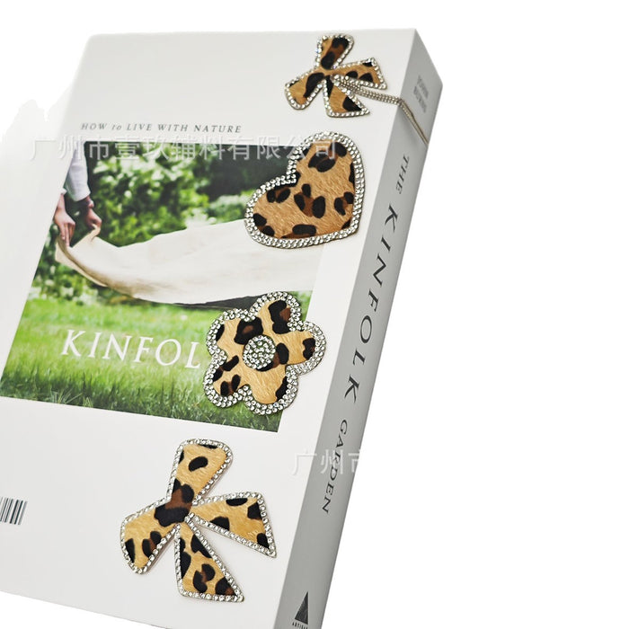 Wholesale Leopard print butterfly and flower rhinestone hotfix iron-on patches for DIY decoration.