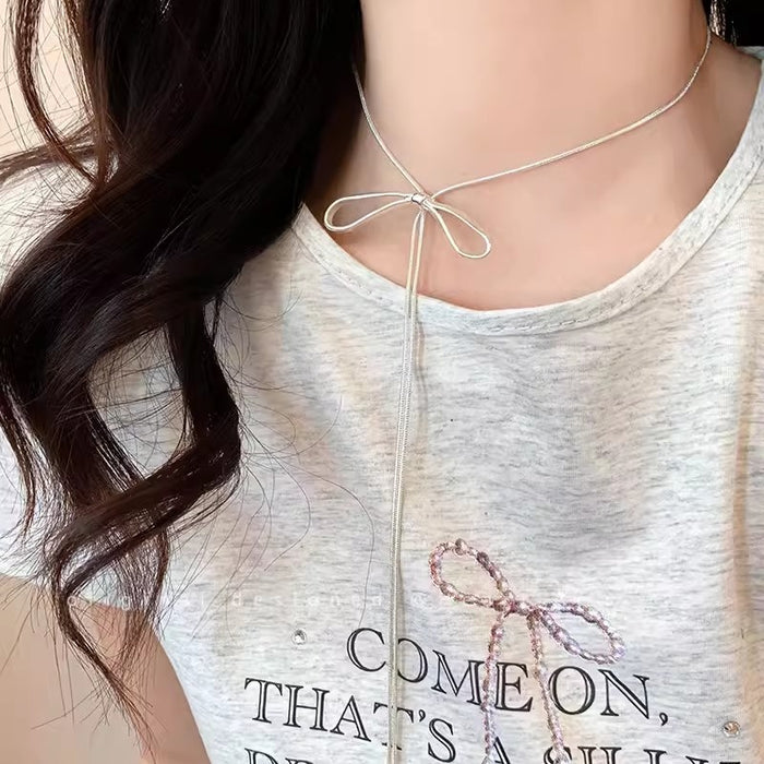 Wholesale Silver bow necklace for women, simple and cool style, long accessory with temperament, collarbone chain