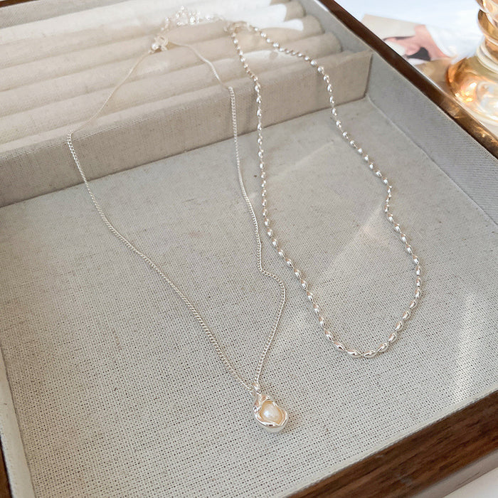 Wholesale Zircon pearl pendant, double-layer layered collarbone chain, high-end, light luxury, fashionable, personalized necklace accessories