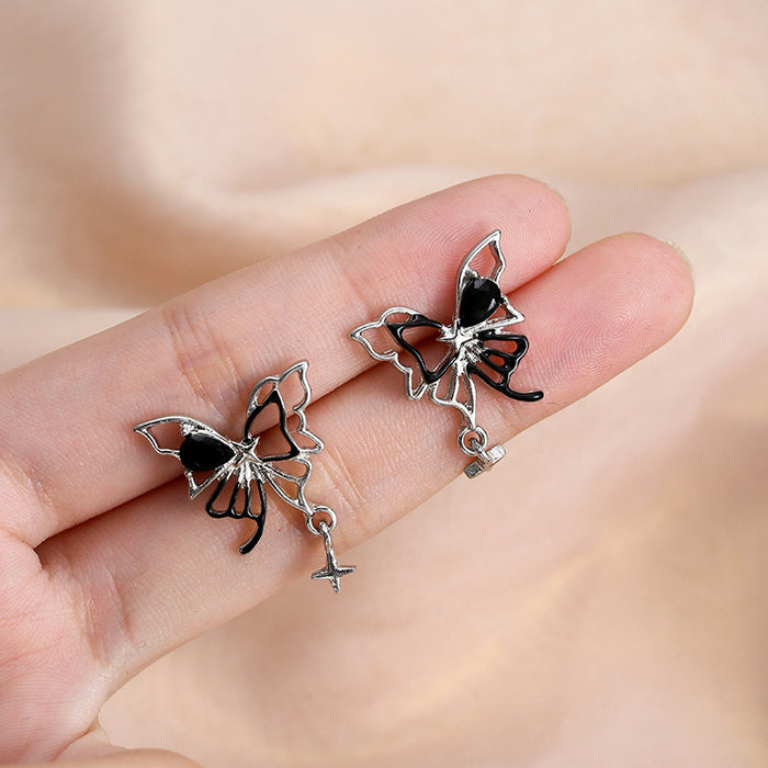 Wholesale Asymmetric butterfly hollow silver needle earrings, new personalized and niche earrings, high-end and versatile earrings