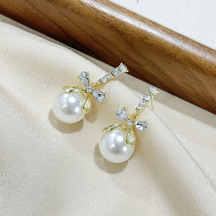 Wholesale Butterfly knot pearl pendant earrings, niche fashion, versatile design, knotted earrings