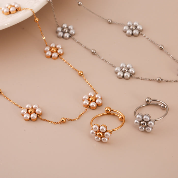 Wholesale Fashion stainless steel daisy flower necklace with pearl inlay, simple petal necklace, ring set wholesale