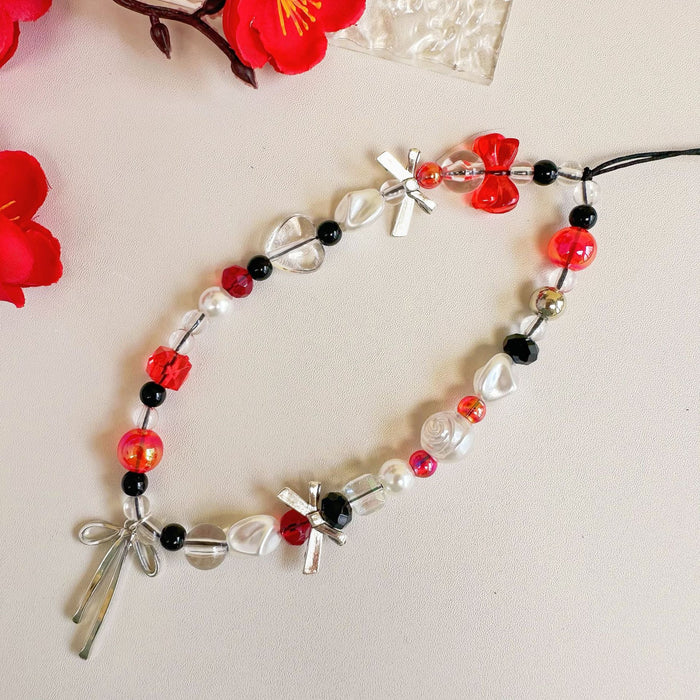 Wholesale red and white alloy ribbon bow mobile phone pendant lanyard mobile phone chain decoration