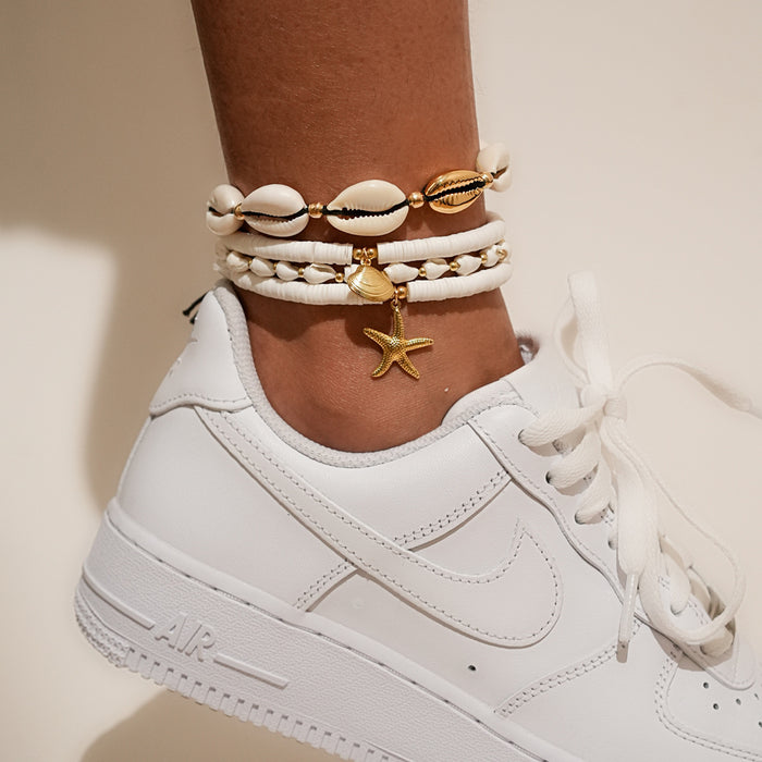 Wholesale Shell foot chain 4-piece set, fashionable and versatile woven foot accessory