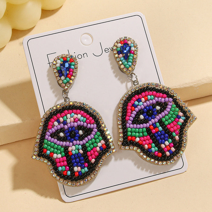 Wholesale Pink Devil' s Eye Rice Bead Earrings