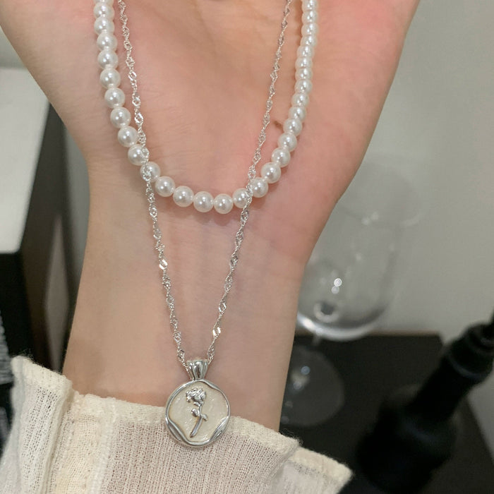 Wholesale Light luxury, gentle, niche design, tulip pearl necklace, pure silver versatile sweater chain, layered and elegant