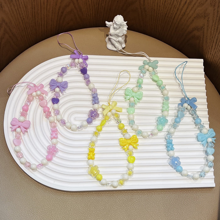 Wholesale ins mobile phone lanyard bowknot lanyard beaded anti-lost pendant