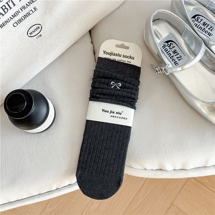 Wholesale Butterfly knot embroidered socks, solid color boneless pile socks, white socks