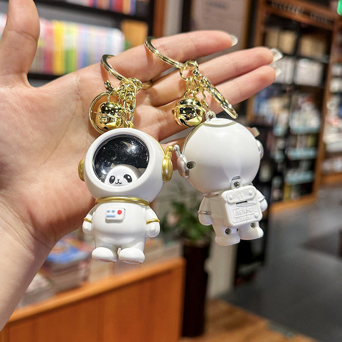 Wholesale Night light astronaut keychain romantic starry sky cute cartoon couple student backpack pendant