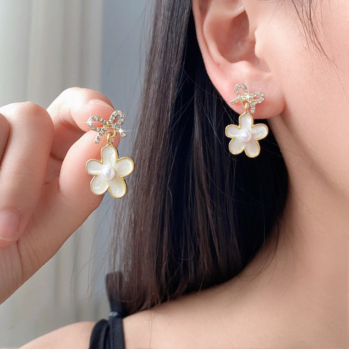 Wholesale Elegant pearl earrings, light luxury, niche, high-end feeling, earrings, butterfly bow flower earrings