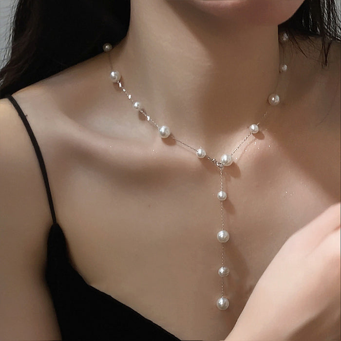Wholesale Titanium steel pearl necklace sweater chain long bead light luxury niche tassel collarbone chain neck chain