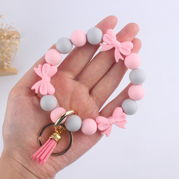 Wholesale Cartoon bow silicone bracelet keychain handmade beaded bracelet jewelry