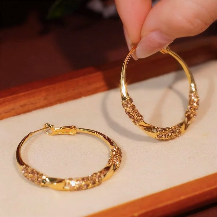 Wholesale Diamond studded twisted circle earrings for women with exaggerated design, unique personality, and retro style earrings