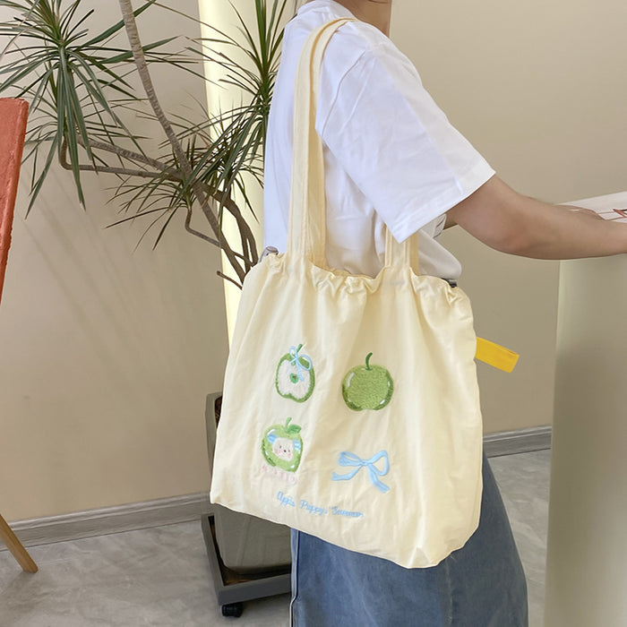 Wholesale New cute cartoon embroidered drawstring shoulder bag, fashionable and simple canvas bag, large capacity tote bag