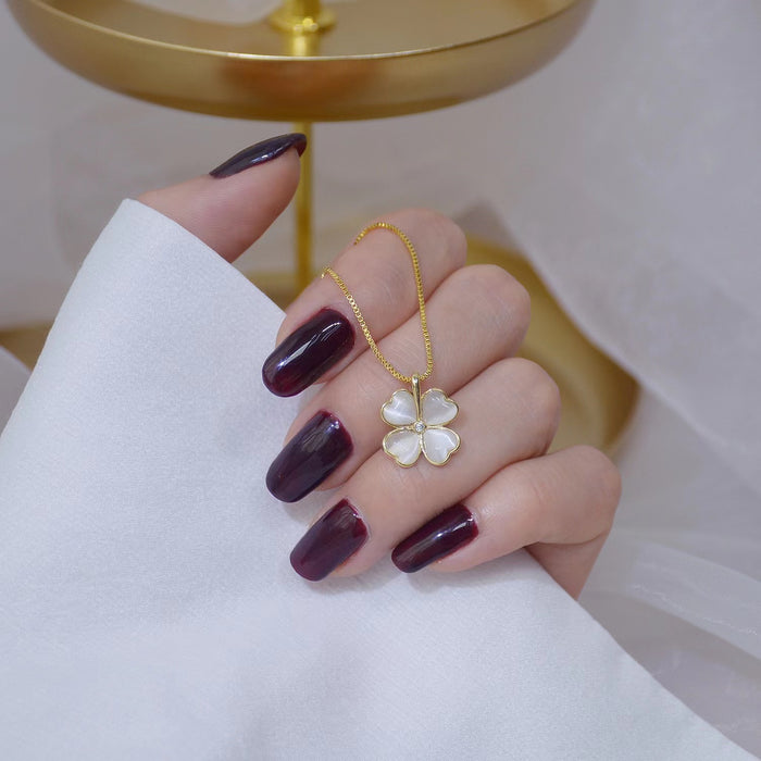 Wholesale Light luxury four leaf clover cat eye necklace, simple, niche, high-end, gentle collarbone chain, neck chain