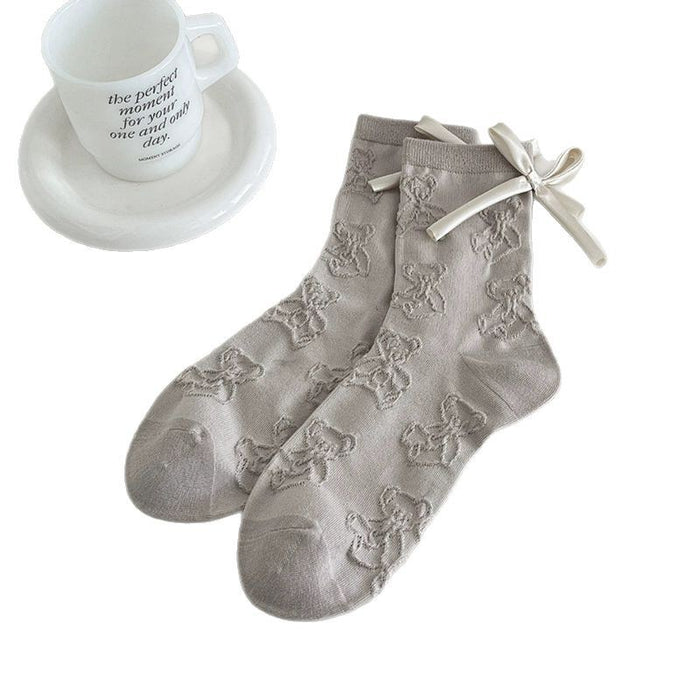 Wholesale Bow shaped mid tube socks with boneless pile socks