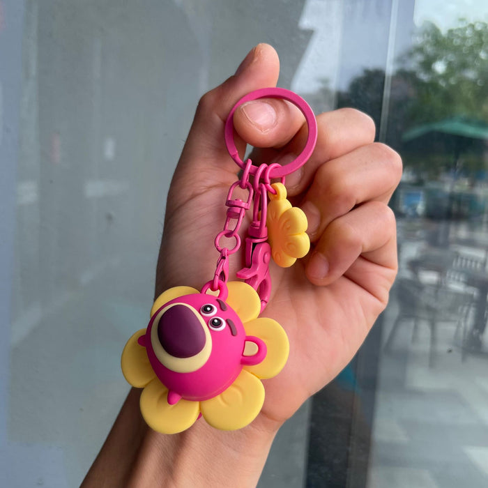 Wholesale Rotating keychain, cute doll bag pendant, hanging decoration, car keychain, smiling face style