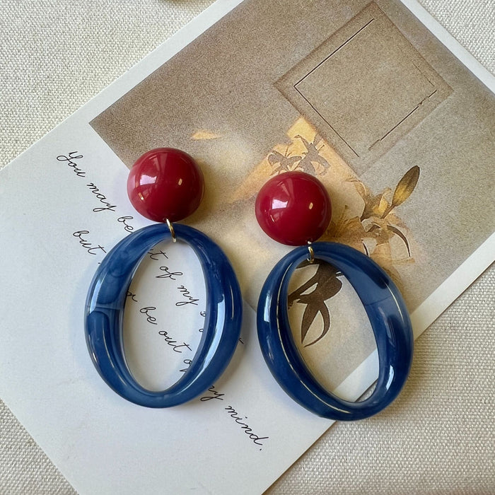 Wholesale Red and blue contrasting geometric ring earrings exude a literary and artistic atmosphere, with personalized and niche earrings for women