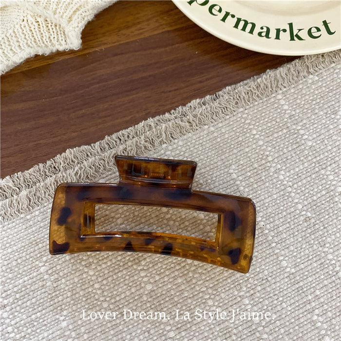 Wholesale Leopard print cross bow geometric hair clip, fashionable grip clip, versatile hair accessory