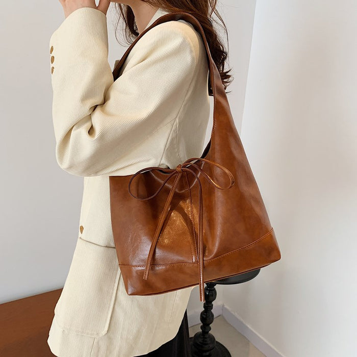 Wholesale Small commuting bag, versatile leisure bag, bow tie, large capacity single shoulder underarm tote bag