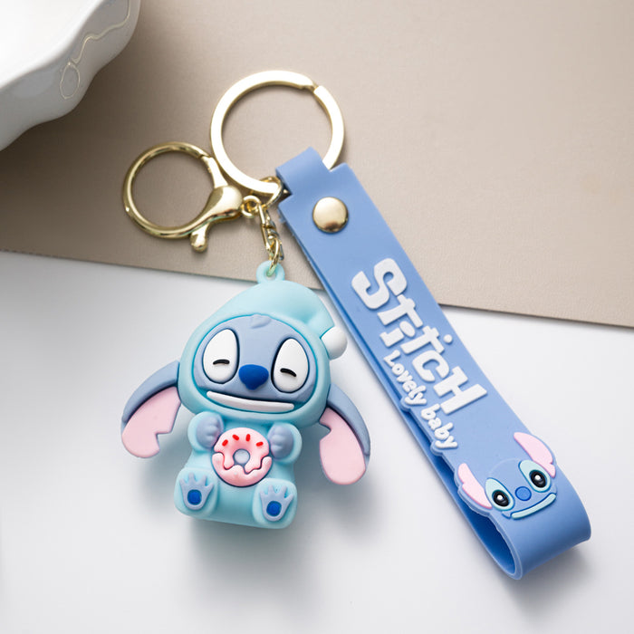 Wholesale Cute cartoon silicone keychains in various colors.