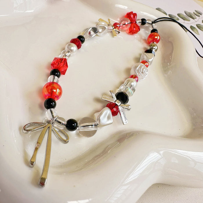 Wholesale red and white alloy ribbon bow mobile phone pendant lanyard mobile phone chain decoration
