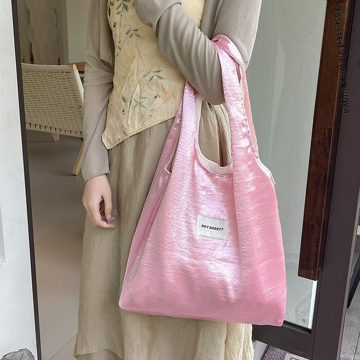 Wholesale Small niche design, environmentally friendly silver shoulder bag, large capacity leisure commuting shopping bag, handheld