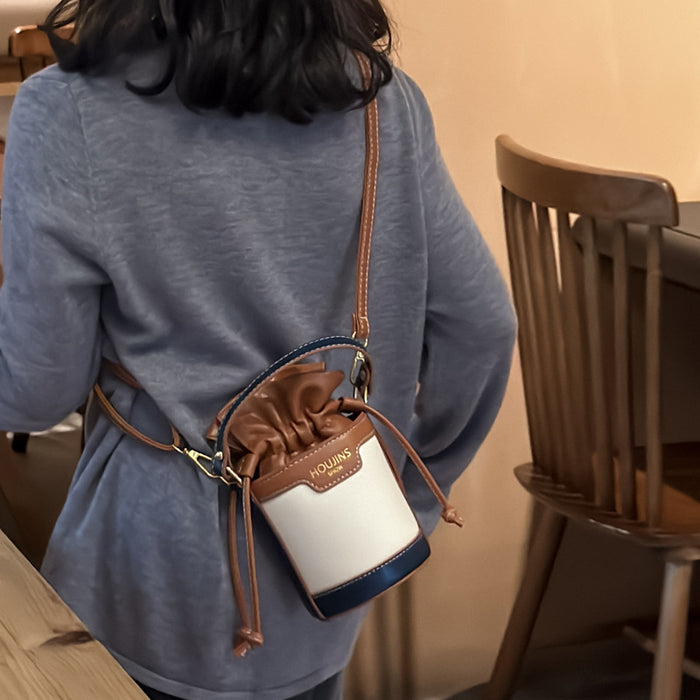 Wholesale Children's bag, contrasting color drawstring bucket bag, new retro crossbody bag for girls