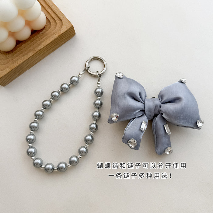 Wholesale Pearl String Bow Shiny Baroque Mobile Phone Hanging Pendant Keychain